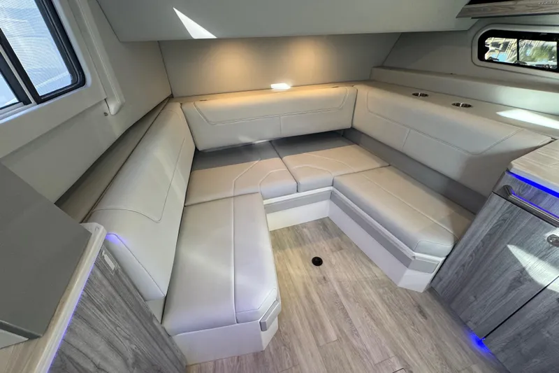 Millennium Falcon Yacht Photos Pics 2023 Formula 400 Super Sport Crossover interior with modern seating and ambient lighting.