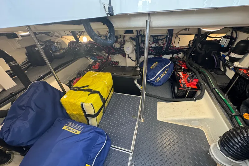 Millennium Falcon Yacht Photos Pics Engine room of 2023 Formula 400 Super Sport Crossover with equipment and storage bags.
