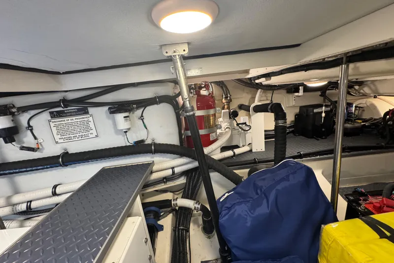 Millennium Falcon Yacht Photos Pics Engine room of 2023 Formula 400 Super Sport Crossover with equipment and storage bags.