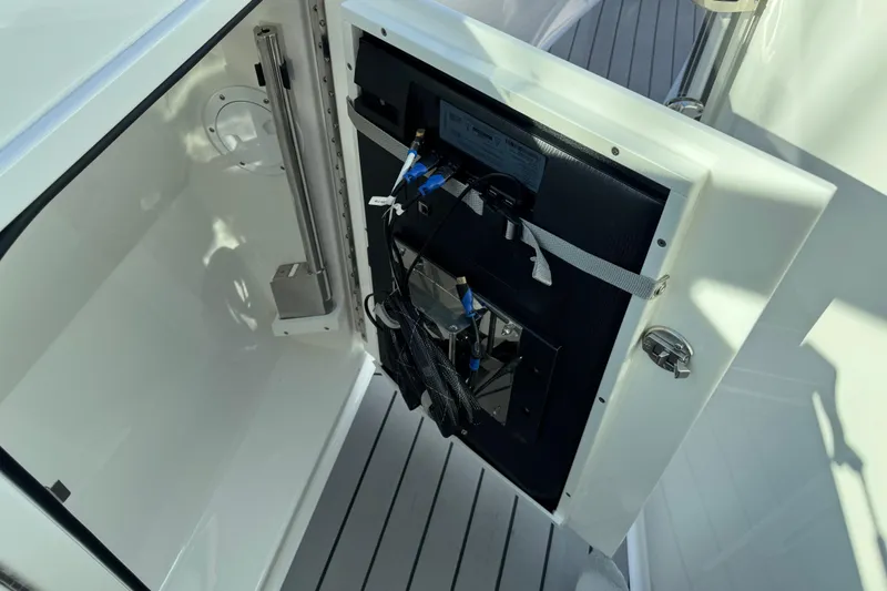 Millennium Falcon Yacht Photos Pics 2023 Formula 400 Super Sport Crossover boat interior compartment with open access panel.