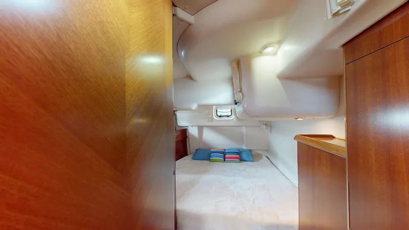 Cadence Yacht Photos Pics Cozy cabin interior of 2008 Jeanneau Sun Odyssey 54 DS sailboat.