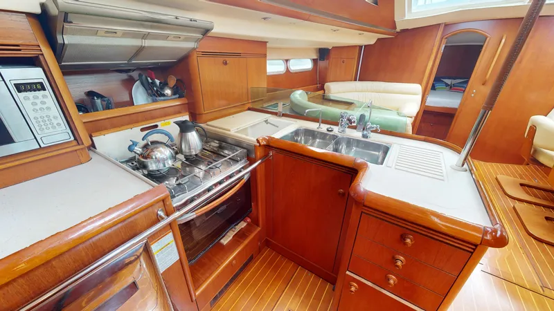 Cadence Yacht Photos Pics Luxurious kitchen interior of 2008 Jeanneau Sun Odyssey 54 DS yacht.