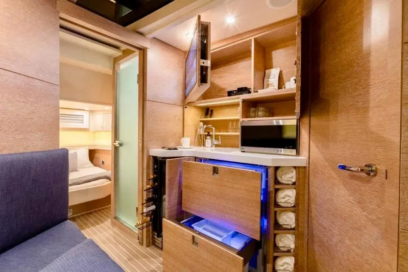 You Only Live Twice Yacht Photos Pics Luxurious interior of 2020 Scout 530 LXF yacht with kitchenette and cozy cabin.