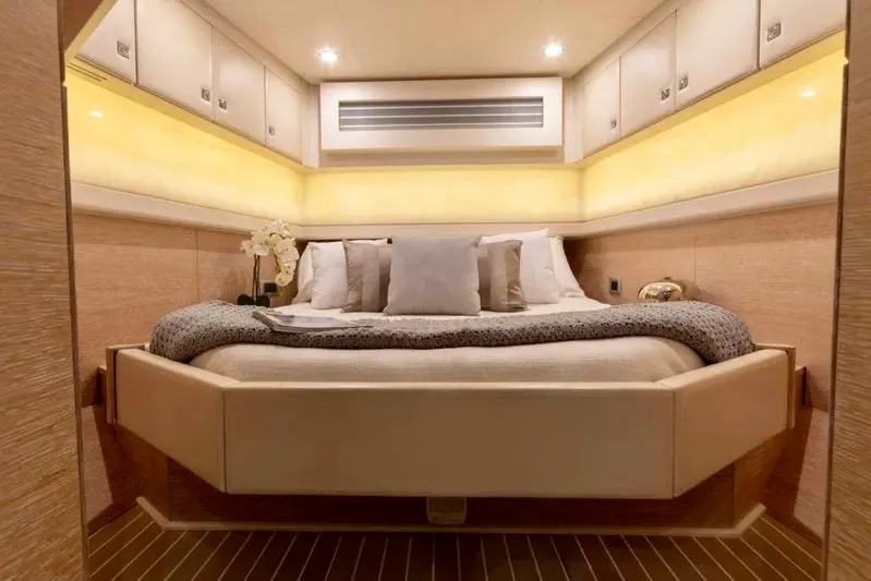 You Only Live Twice Yacht Photos Pics Luxurious bedroom interior of 2020 Scout 530 LXF yacht with elegant lighting and decor.