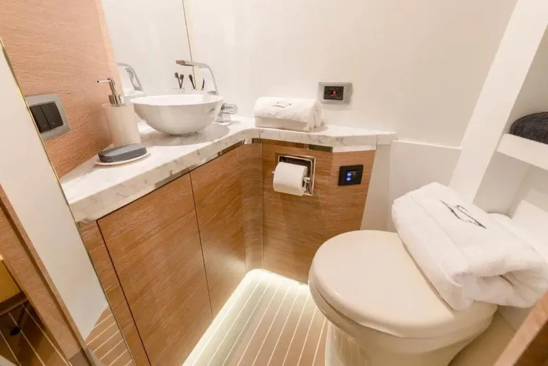 You Only Live Twice Yacht Photos Pics Luxurious bathroom in 2020 Scout 530 LXF yacht with modern fixtures and elegant design.