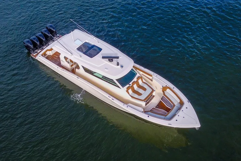 You Only Live Twice Yacht Photos Pics 2020 Scout 530 LXF luxury yacht cruising on open water, aerial view.