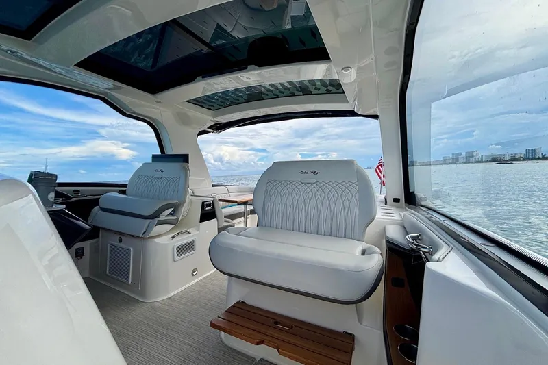  Yacht Photos Pics Interior of 2022 Sea Ray Sundancer 370 Outboard with luxurious seating and ocean view.