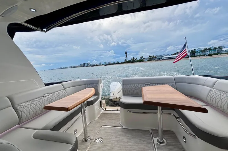  Yacht Photos Pics Luxury seating area on 2022 Sea Ray Sundancer 370 Outboard with ocean view.