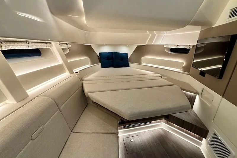  Yacht Photos Pics Luxurious interior of 2022 Sea Ray Sundancer 370 Outboard with modern seating and ambient lighting.