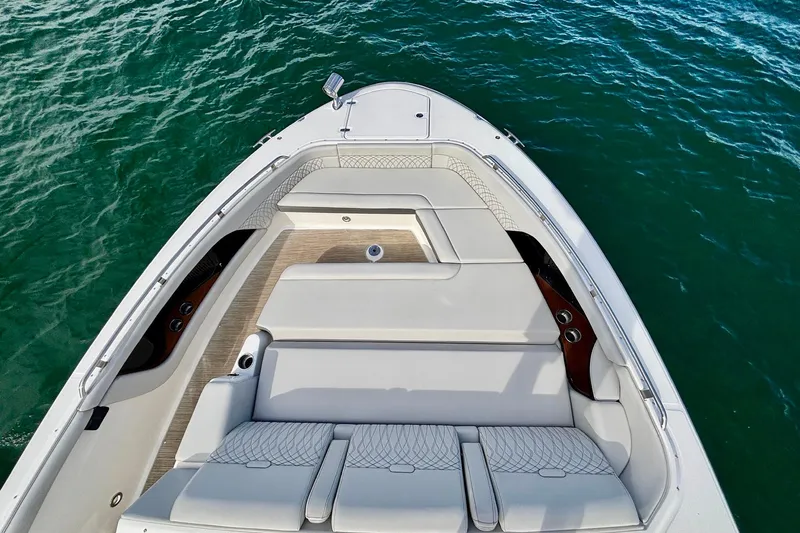  Yacht Photos Pics 2022 Sea Ray Sundancer 370 Outboard boat interior with luxurious seating on water.