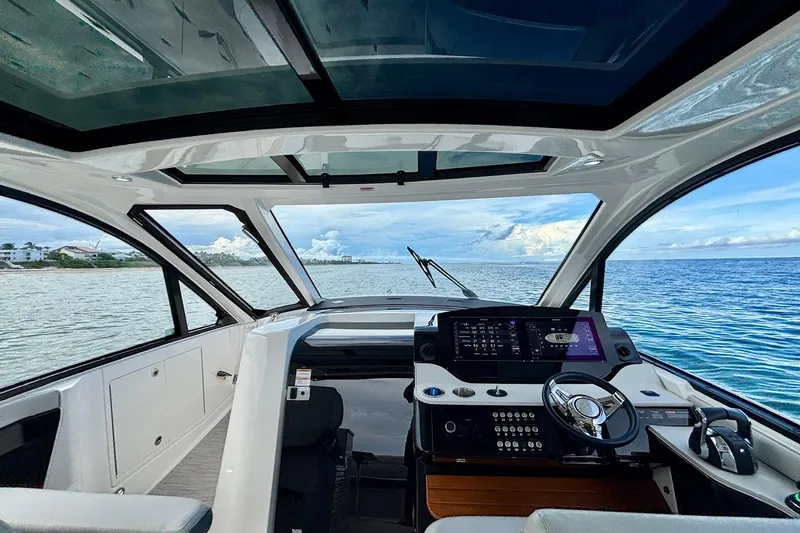  Yacht Photos Pics 2022 Sea Ray Sundancer 370 Outboard helm with panoramic ocean view.