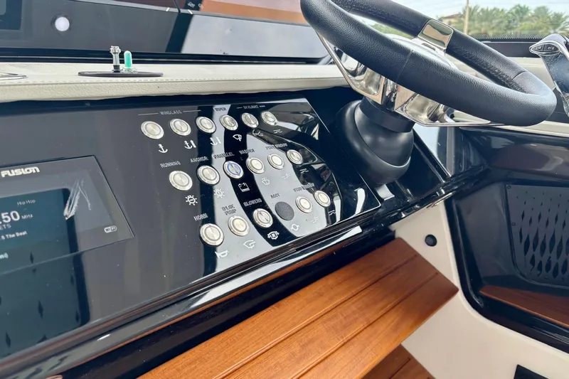  Yacht Photos Pics 2022 Sea Ray Sundancer 370 Outboard dashboard with steering wheel and control panel.