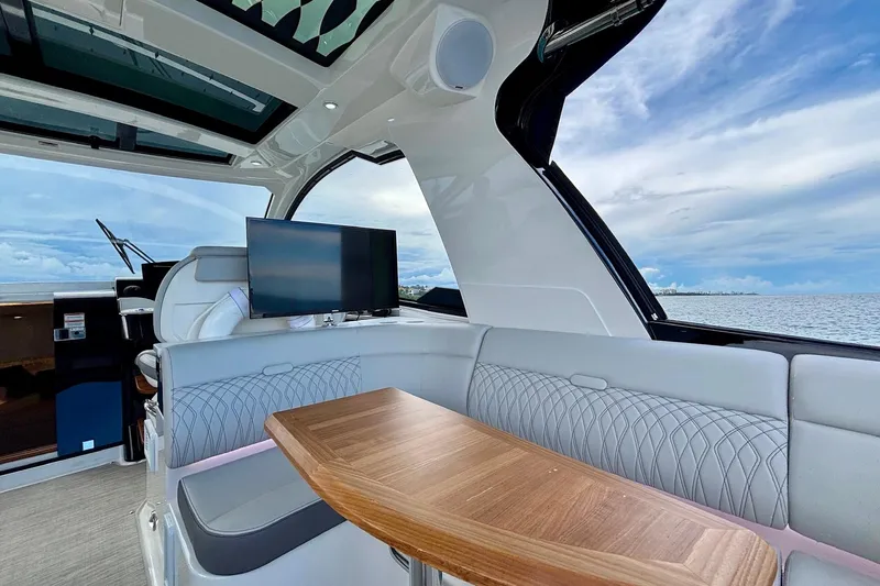 Yacht Photos Pics Luxurious interior of 2022 Sea Ray Sundancer 370 Outboard with ocean view.