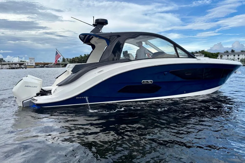  Yacht Photos Pics 2022 Sea Ray Sundancer 370 Outboard on water, showcasing sleek design and powerful Mercury engines.