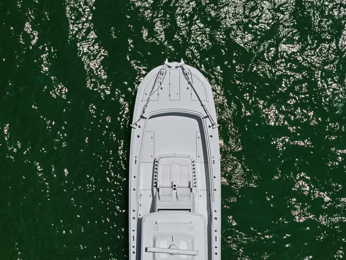 Down Range Yacht Photos Pics Overhead view of 2023 Barker Boatworks 40 HPC on shimmering green water.