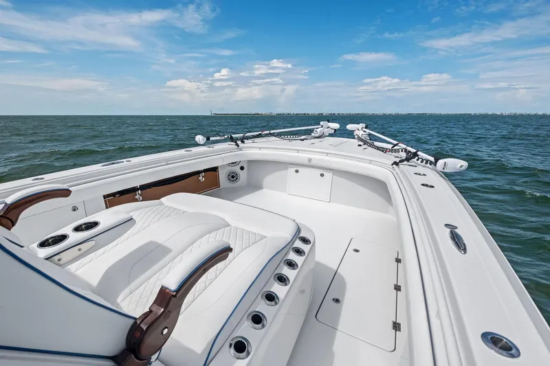 Down Range Yacht Photos Pics 2023 Barker Boatworks 40 HPC on open water, showcasing sleek design and spacious deck.