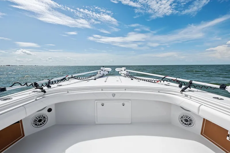 Down Range Yacht Photos Pics 2023 Barker Boatworks 40 HPC on open sea under clear blue sky.