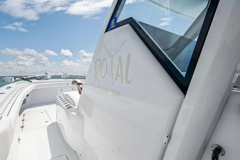 Down Range Yacht Photos Pics 2023 Barker Boatworks 40 HPC on open water, featuring sleek design and clear skies.