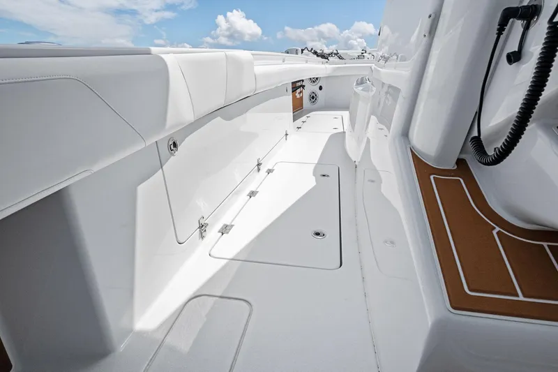 Down Range Yacht Photos Pics 2023 Barker Boatworks 40 HPC interior with sleek white design and modern features.