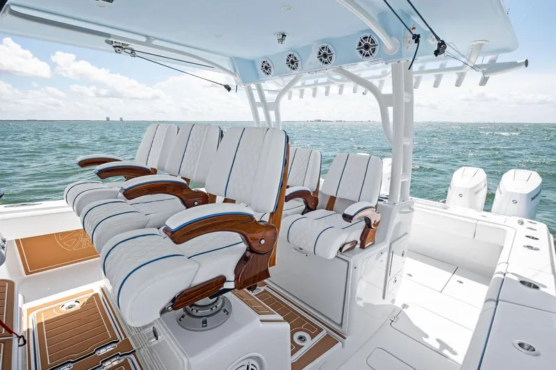 Down Range Yacht Photos Pics 2023 Barker Boatworks 40 HPC interior with luxurious seating on open water.