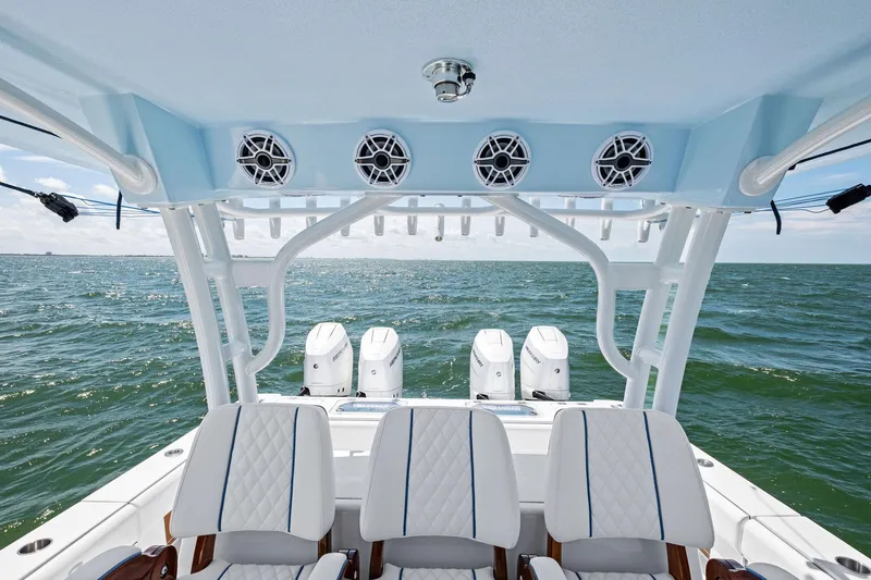 Down Range Yacht Photos Pics 2023 Barker Boatworks 40 HPC with luxurious seating and powerful engines on open water.