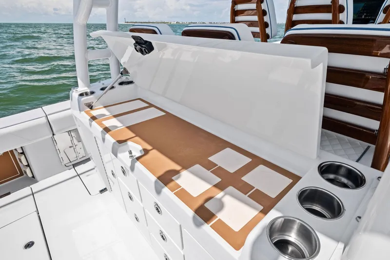 Down Range Yacht Photos Pics 2023 Barker Boatworks 40 HPC fishing station with storage and cup holders on deck.