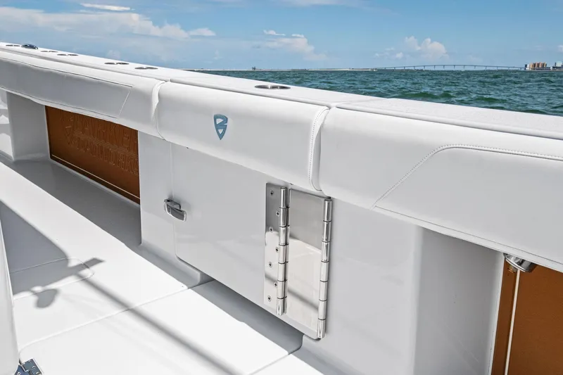 Down Range Yacht Photos Pics 2023 Barker Boatworks 40 HPC interior detail with ocean view and sleek white design.