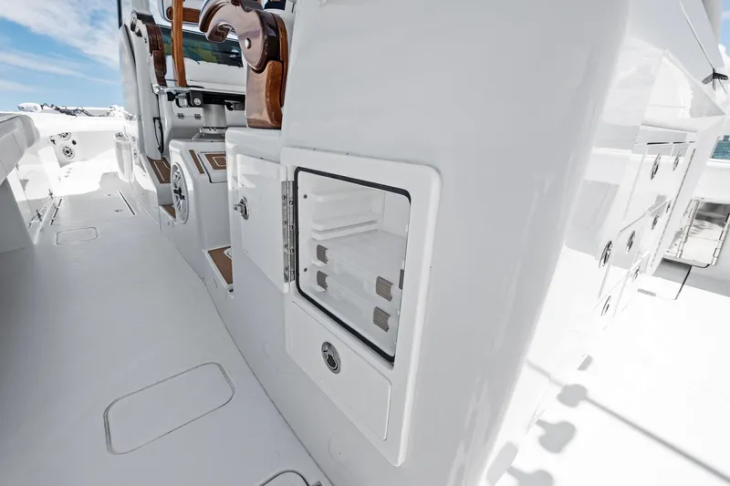 Down Range Yacht Photos Pics 2023 Barker Boatworks 40 HPC interior with storage compartments and seating.