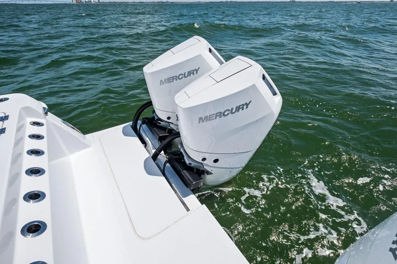 Down Range Yacht Photos Pics 2023 Barker Boatworks 40 HPC with dual Mercury outboard engines on open water.