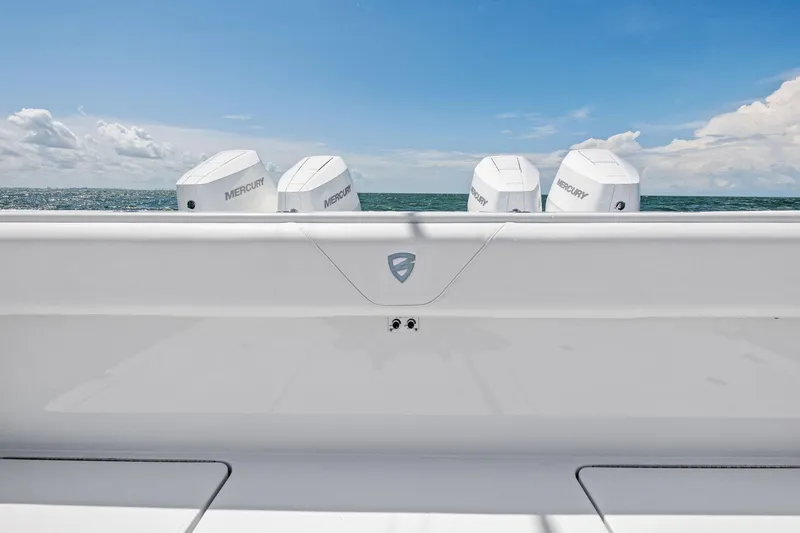 Down Range Yacht Photos Pics 2023 Barker Boatworks 40 HPC with Mercury engines on open sea.