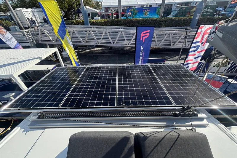 The Ilusion Yacht Photos Pics Solar panels on 2025 Fountaine Pajot 41 catamaran at a boat show display.