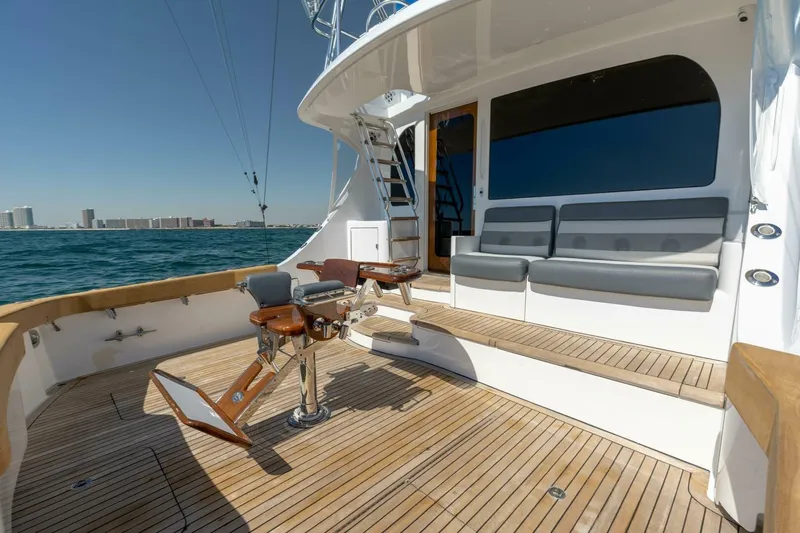  Yacht Photos Pics Luxurious 2012 Hatteras 60 GT yacht deck with seating and ocean view.