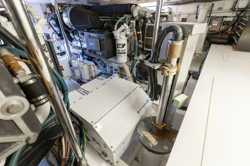  Yacht Photos Pics Engine room of 2012 Hatteras 60 GT yacht, featuring advanced machinery and equipment.