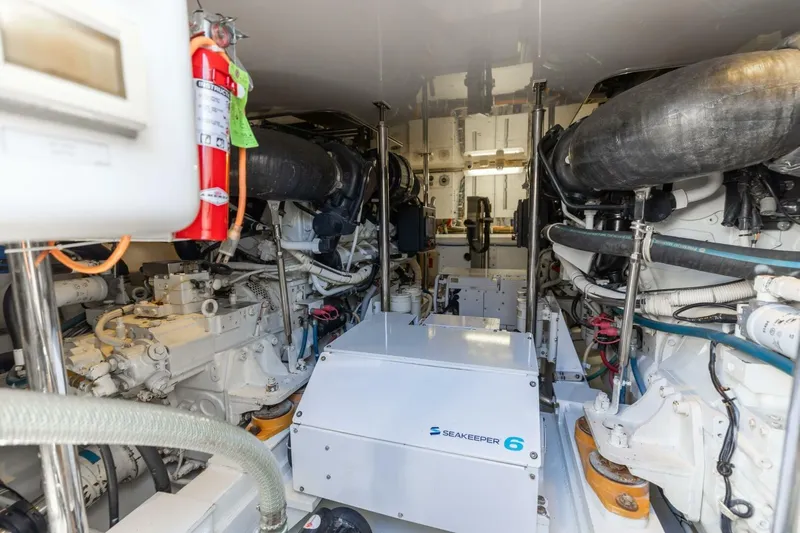  Yacht Photos Pics Engine room of 2012 Hatteras 60 GT yacht with Seakeeper 6 stabilizer system.