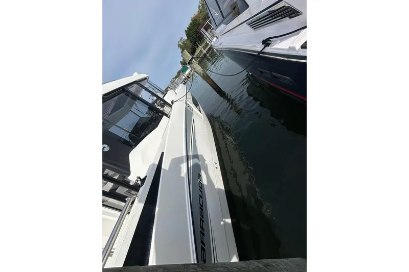  Yacht Photos Pics 2020 Beneteau Barracuda 9 docked, showcasing sleek design and modern features.