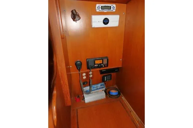 Sun Bird Yacht Photos Pics Control panel in 2002 Tayana 460 Vancouver Pilothouse, featuring navigation and communication equipment.