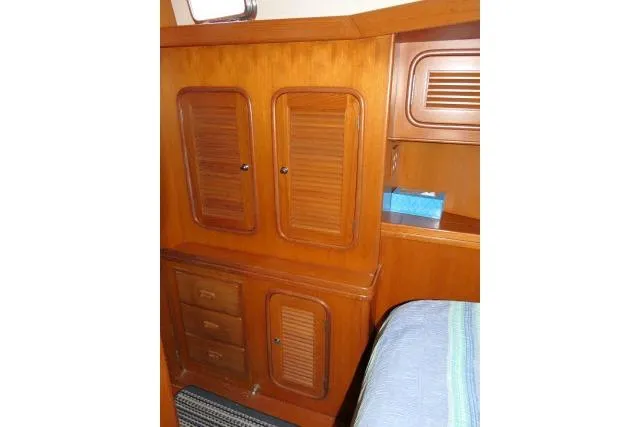 Sun Bird Yacht Photos Pics 2002 Tayana 460 Vancouver Pilothouse interior with wooden cabinets and drawers.