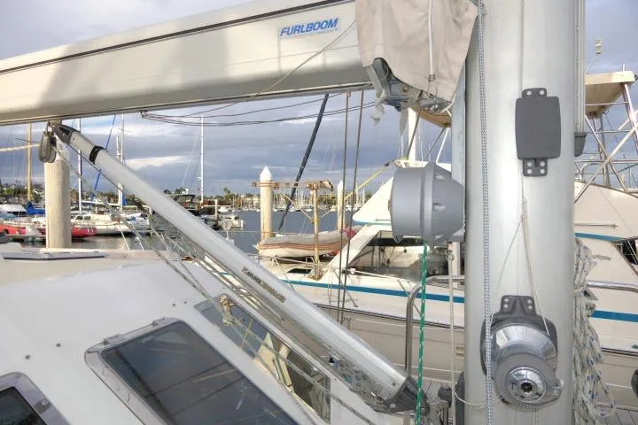 Sun Bird Yacht Photos Pics 2002 Tayana 460 Vancouver Pilothouse sailboat mast and rigging in marina setting.