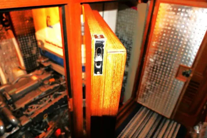 Sun Bird Yacht Photos Pics Interior view of 2002 Tayana 460 Vancouver Pilothouse, showcasing wooden cabinetry and engine room.