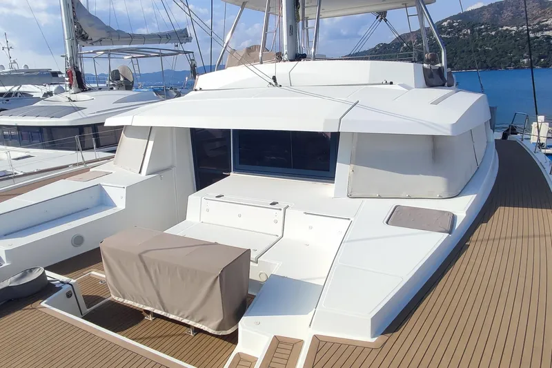 Helios Yacht Photos Pics Luxury Bali 5.4 catamaran deck, 2021 model, with spacious seating and scenic ocean view.