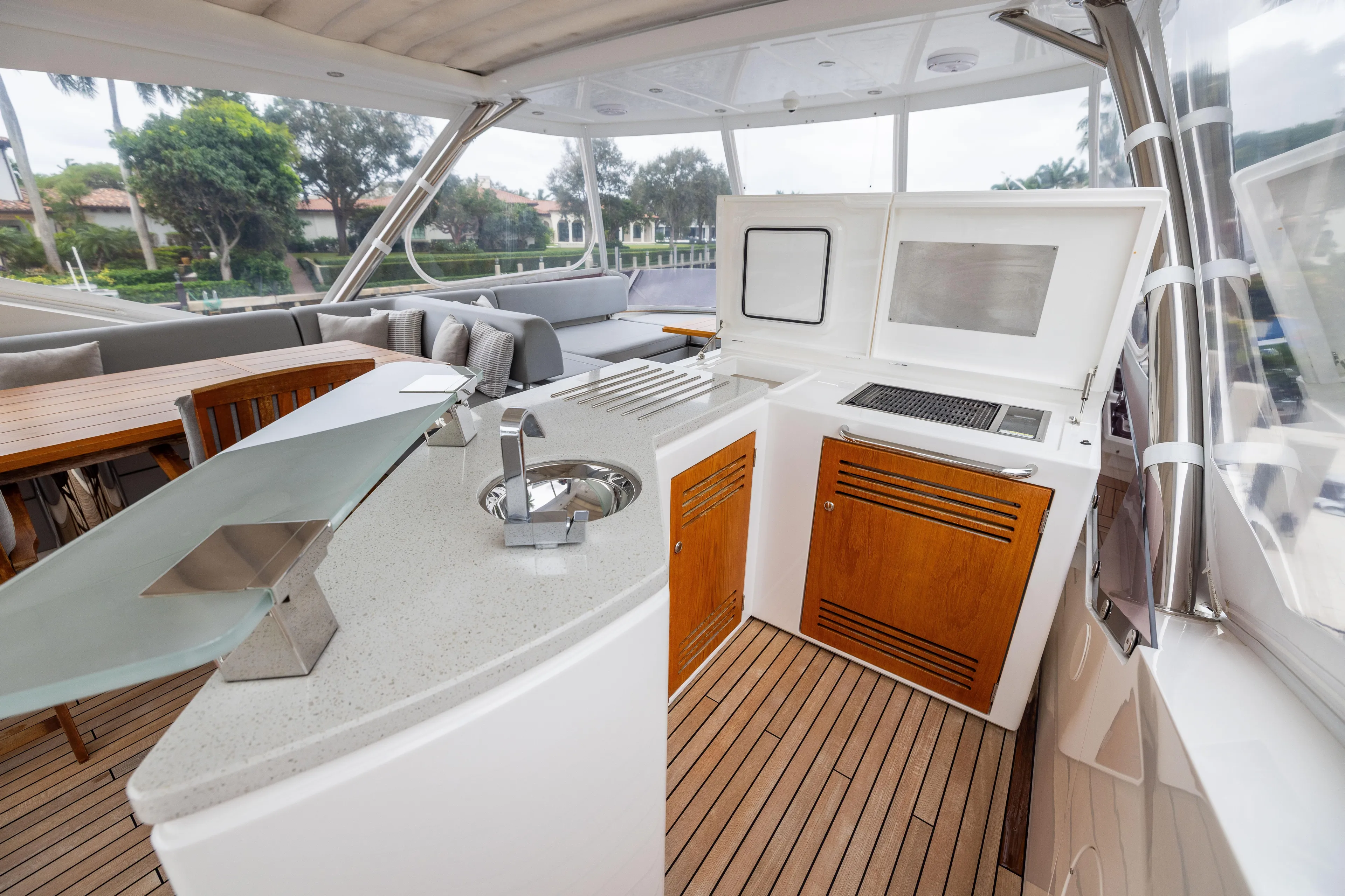 Journey Yacht Photos Pics Luxurious Sunseeker 76 yacht interior with modern kitchen and seating area, 2019 model.