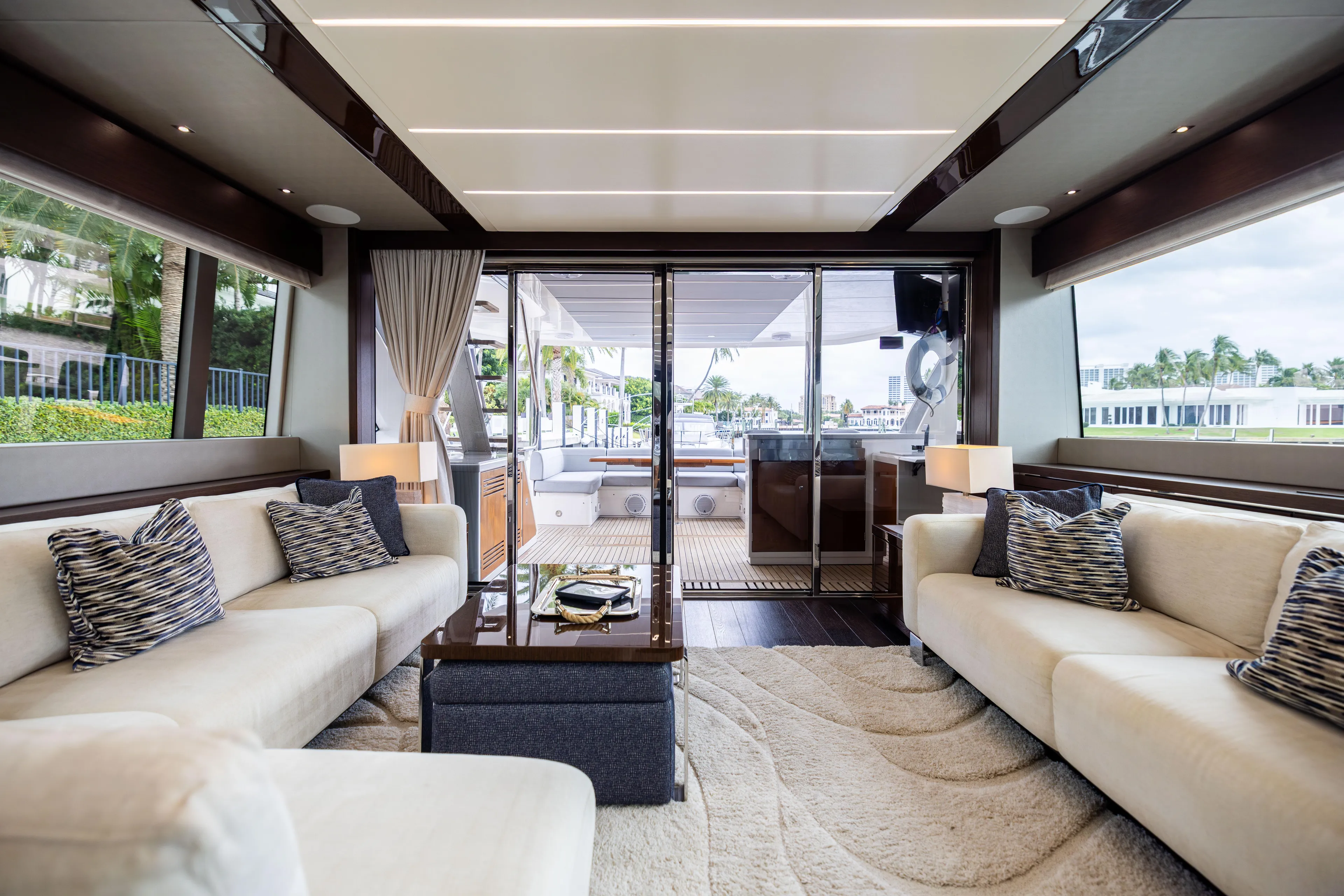 Journey Yacht Photos Pics Luxurious interior of 2019 Sunseeker 76 yacht with elegant seating and modern decor.