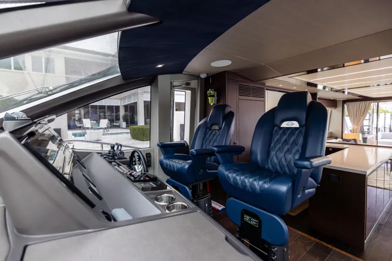 Journey Yacht Photos Pics Luxurious 2019 Sunseeker 76 yacht interior with modern helm and plush seating.