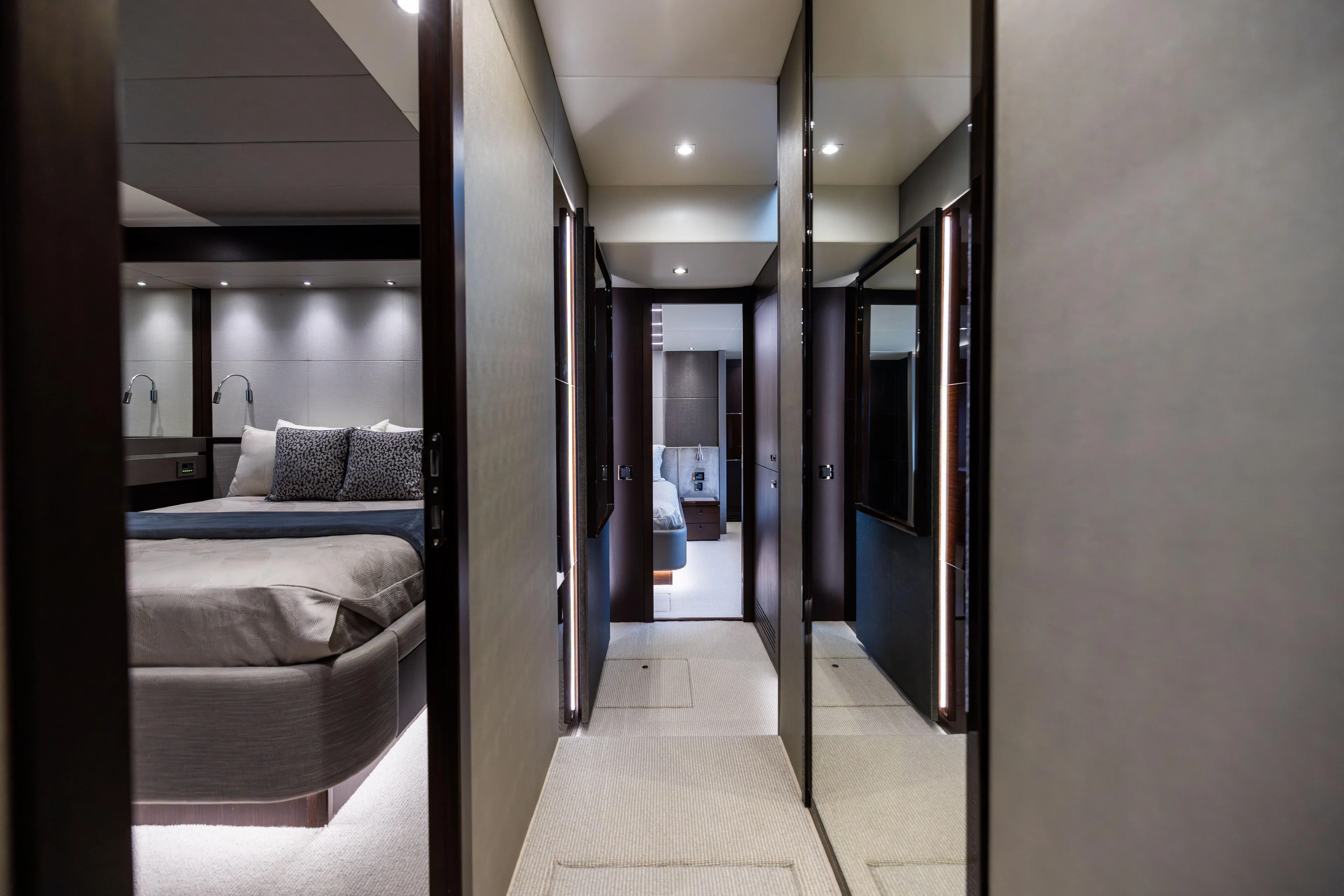 Journey Yacht Photos Pics Luxurious interior of 2019 Sunseeker 76 yacht, featuring elegant bedrooms and modern design.
