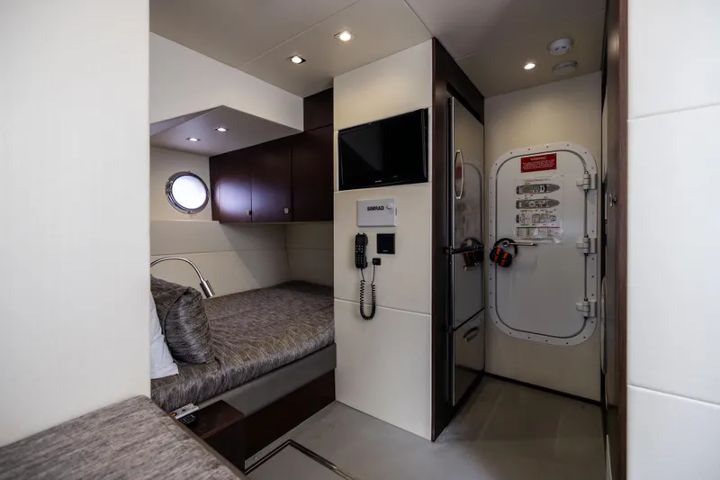 Journey Yacht Photos Pics Luxurious cabin interior of 2019 Sunseeker 76 yacht with modern amenities.