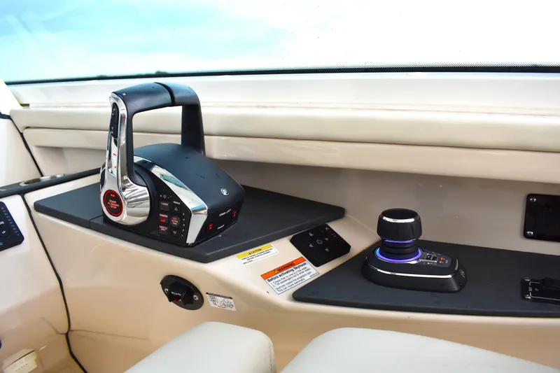  Yacht Photos Pics 2023 Boston Whaler 320 Vantage helm controls with joystick and throttle.