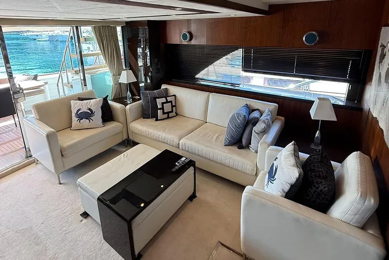  Yacht Photos Pics Luxurious interior of 2014 Fairline Squadron 78 yacht with elegant seating and sea view.
