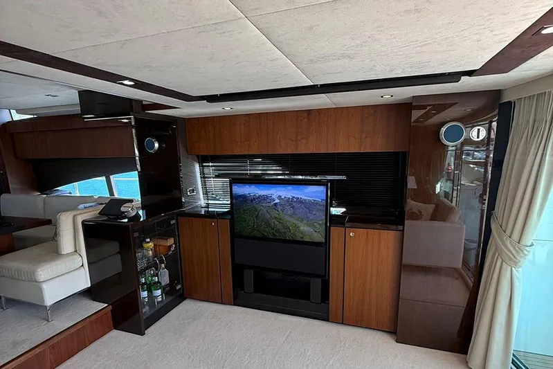  Yacht Photos Pics Luxurious interior of 2014 Fairline Squadron 78 yacht with modern entertainment system.