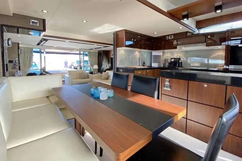  Yacht Photos Pics Luxurious interior of 2014 Fairline Squadron 78 yacht with modern kitchen and dining area.
