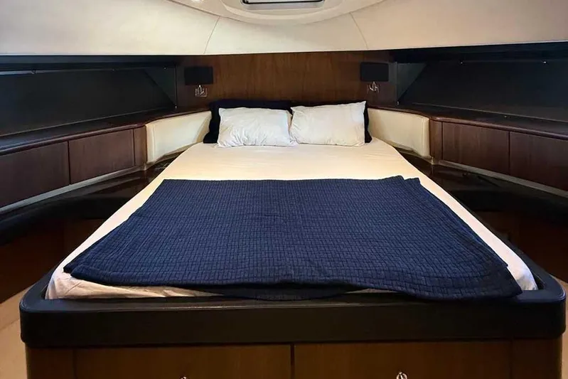  Yacht Photos Pics Luxurious bedroom interior of 2014 Fairline Squadron 78 yacht with elegant bedding.